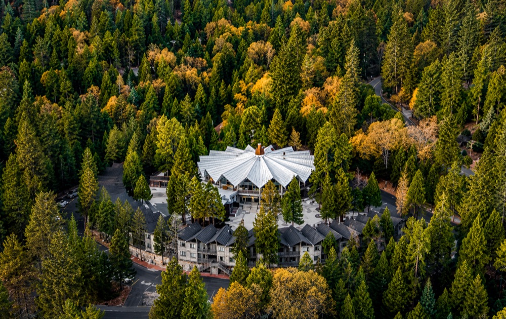 Aerial view of the Twin Peaks campus set among the pines at 5,777 feet